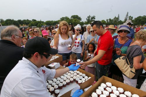 Canada Day party at the Assiniboine Park Lyric Theatre. Free cake for everyone. BORIS MINKEVICH/WINNIPEG FREE PRESS July 1, 2015