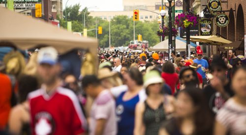 Osborne street is closed off for traffic and filled with pedestrians at the annual Osborne Street Festival on Wednesday, July 1, 2015. Mikaela MacKenzie / Winnipeg Free Press