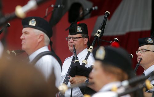 Canada Day party at the Assiniboine Park Lyric Theatre. The Winnipeg Police Pipe band play. BORIS MINKEVICH/WINNIPEG FREE PRESS July 1, 2015