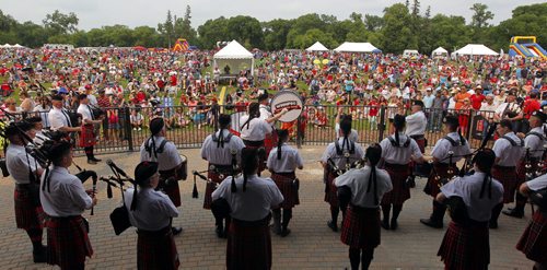 Canada Day party at the Assiniboine Park Lyric Theatre. The Winnipeg Police Pipe band play. BORIS MINKEVICH/WINNIPEG FREE PRESS July 1, 2015