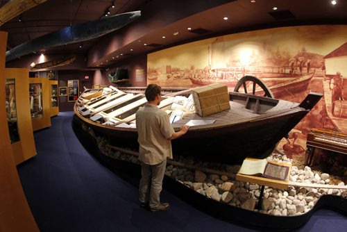 The Manitoba Museum. An old Hudson Bay boat on display. Staff member stands at the boat. BORIS MINKEVICH/WINNIPEG FREE PRESS July 1, 2015