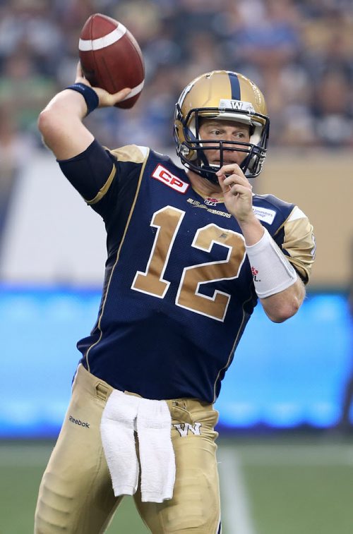 Winnipeg Blue Bombers' quarterback Brian Brohm (12) came in to relieve an injured quarterback Drew Willy (5) against the Hamilton Tiger-Cats' Thursday, July 2, 2015. (TREVOR HAGAN/WINNIPEG FREE PRESS)