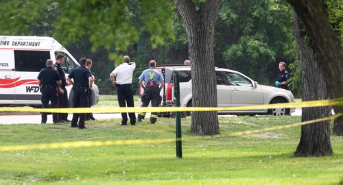 A small robotic bomb detector is used to check vehicles along River Ave. for potential bombs on Friday afternoon after a bomb went off  at Petersen and King Law Office at 252 River Ave. Friday morning.   See story.  July 03,, 2015 Ruth Bonneville / Winnipeg Free Press