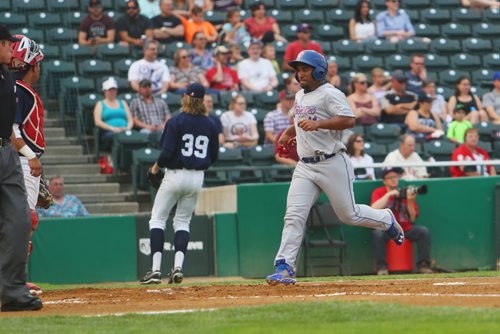 Roberto Ramirez of the Ottawa Champions runs home at Shaw Park in Winnipeg on Friday, July 3, 2015. Mikaela MacKenzie / Winnipeg Free Press