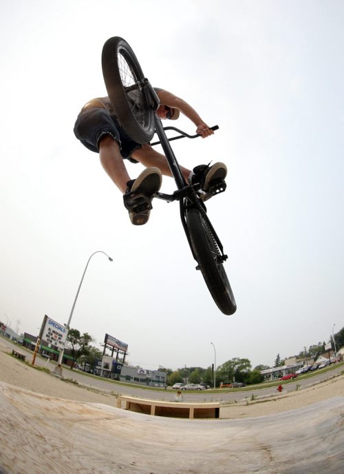 Wayne Hartman riding at the first BMX jam at Royal Sports on Pembina Highway. There was a friendly competition with prizes for tricks, Saturday, July 4, 2015. (TREVOR HAGAN/WINNIPEG FREE PRESS)