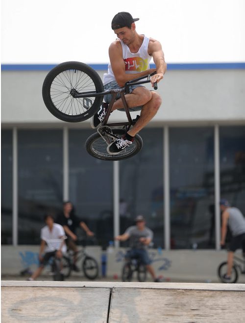 Colin Thiessen does a table top air at the first BMX jam at Royal Sports on Pembina Highway. There was a friendly competition with prizes for tricks, Saturday, July 4, 2015. (TREVOR HAGAN/WINNIPEG FREE PRESS)