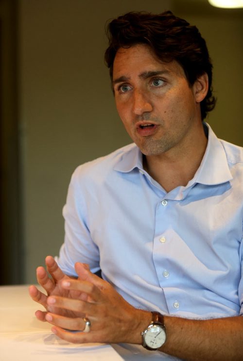 Liberal leader, Justin Trudeau, speaking with Shannon Sampert, Saturday, July 4, 2015. (TREVOR HAGAN/WINNIPEG FREE PRESS)