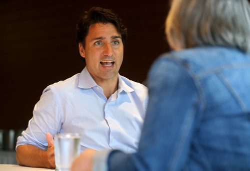 Liberal leader, Justin Trudeau, speaking with Shannon Sampert, Saturday, July 4, 2015. (TREVOR HAGAN/WINNIPEG FREE PRESS)