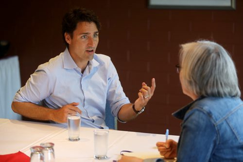 Liberal leader, Justin Trudeau, speaking with Shannon Sampert, Saturday, July 4, 2015. (TREVOR HAGAN/WINNIPEG FREE PRESS)