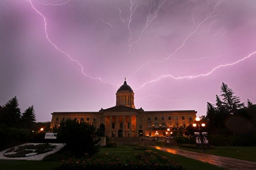 Lightning spreads across the sky above the Manitoba Legislative Building, Saturday, July 4, 2015. (TREVOR HAGAN/WINNIPEG FREE PRESS)