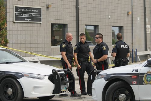 July 5, 2015 - 150705  -  Police investigate at a law office on River Avenue Sunday, July 5, 2015. John Woods / Winnipeg Free Press