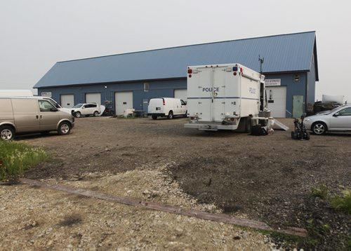 July 5, 2015 - 150705  -  Winnipeg Police execute a search warrant at a business at 2208 Springfield Road after they announced they have a "person of interest" in custody in relation to a recent explosion and other incidents in Winnipeg Sunday, July 5, 2015. John Woods / Winnipeg Free Press