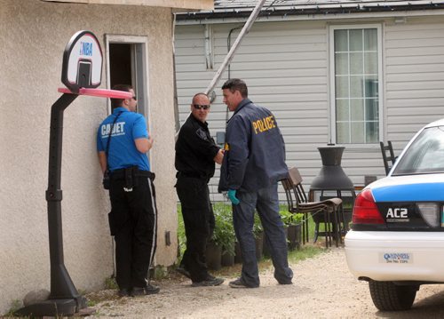 Winnipeg Police still gathering evidence Monday at the Pandora Ave E home of bombing suspect 49-year-old Guido Amsel-Breaking News- July 06, 2015   (JOE BRYKSA / WINNIPEG FREE PRESS)