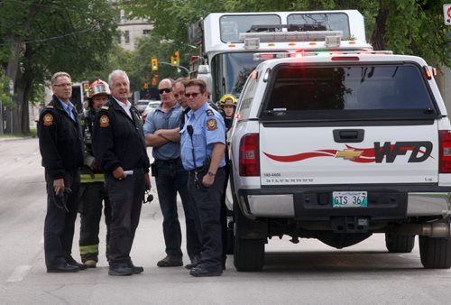 Winnipeg Fire/RCMP and Winnipeg Police responded Monday morning to the Can Post building on McDermot to inspect a suspicious package- It turned out to be a DVD and not a explosive package-( See Bill Redekop story) - July 06, 2015   (JOE BRYKSA / WINNIPEG FREE PRESS)