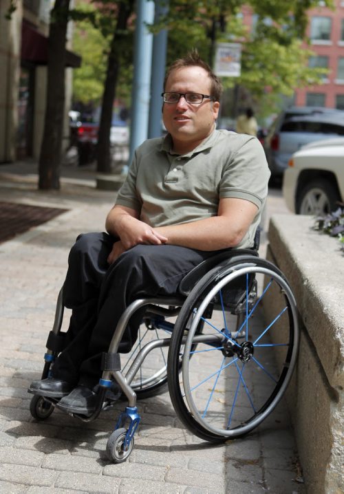 Allen Mankewich is in a wheelchair since birth and is the subject in Jen Zoratti story about accessibility for concerts and festivals. BORIS MINKEVICH/WINNIPEG FREE PRESS July 6, 2015