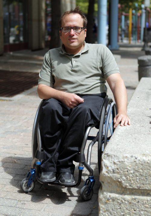 Allen Mankewich is in a wheelchair since birth and is the subject in Jen Zoratti story about accessibility for concerts and festivals. BORIS MINKEVICH/WINNIPEG FREE PRESS July 6, 2015