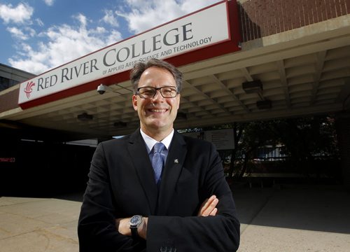 Red River Colleges (RRC) Board of Governors has named Paul Vogt as the institutions fifth president and CEO effective Aug. 17. Here he is photographed at the front of the school on Notre Dame. BORIS MINKEVICH/WINNIPEG FREE PRESS July 6, 2015