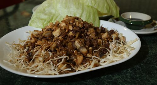 Super Snow Dish (served with lettuce wraps and hoisin sauce) at Dragon Palace at 3060 Portage Ave. Photographed for restaurant review. Photo by Jason Halstead/Winnipeg Free Press