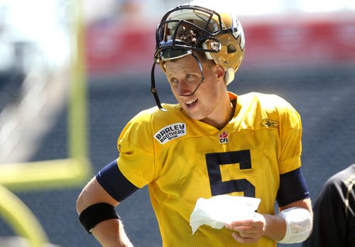 Blue Bomber QB # 5 Drew Willy, looks over plays during  practice at Investors Group Field Tuesday.  July 07, 2015 Ruth Bonneville / Winnipeg Free Press