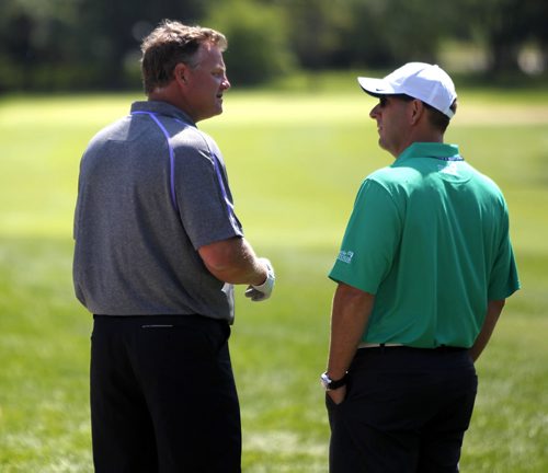 The Players Cup at Pine Ridge Golf Course. (L) Former Winnipeg Jets Dave Manson talks to a fellow player. BORIS MINKEVICH/WINNIPEG FREE PRESS July 7, 2015