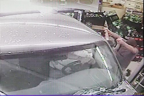 July 7, 2015 - 150707  -  Store surveillance video shows a truck crashing through the window of a Munroe Avenue convenience store Tuesday, July 7, 2015. The truck ran over a young boy who was pulled to safety by his dad. John Woods / Winnipeg Free Press