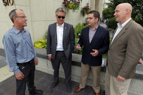 Five councillors are rallying against the citys cycling strategy and took out a radio ad today that will run until council votes on the strategy next Wednesday. Four of those councillors: Shawn Dobson, Ross Eadie, Jeff Browaty, and Jason Schreyer pose for a photo. BORIS MINKEVICH/WINNIPEG FREE PRESS July 8, 2015