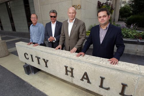 Five councillors are rallying against the citys cycling strategy and took out a radio ad today that will run until council votes on the strategy next Wednesday. Four of those councillors: Shawn Dobson, Ross Eadie, Jason Schreyer, and Jeff Browaty pose for a photo. BORIS MINKEVICH/WINNIPEG FREE PRESS July 8, 2015