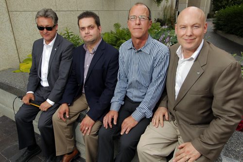 Five councillors are rallying against the citys cycling strategy and took out a radio ad today that will run until council votes on the strategy next Wednesday. Four of those councillors: Ross Eadie, Jeff Browaty, Shawn Dobson,and Jason Schreyer pose for a photo. BORIS MINKEVICH/WINNIPEG FREE PRESS July 8, 2015
