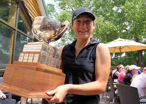 Sixteen-year-old Camryn Roadley is handed the trophy after wining the Women's Amateur Golf Championships  at St. Boniface Golf Course Wednesday.  See Jeff Hamilton story.  July 08, 2015 Ruth Bonneville / Winnipeg Free Press