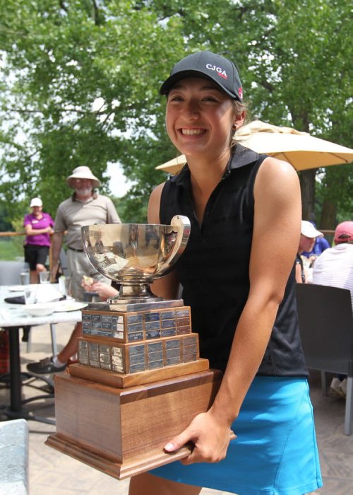 Sixteen-year-old Camryn Roadley is handed the trophy after wining the Women's Amateur Golf Championships  at St. Boniface Golf Course Wednesday.  See Jeff Hamilton story.  July 08, 2015 Ruth Bonneville / Winnipeg Free Press
