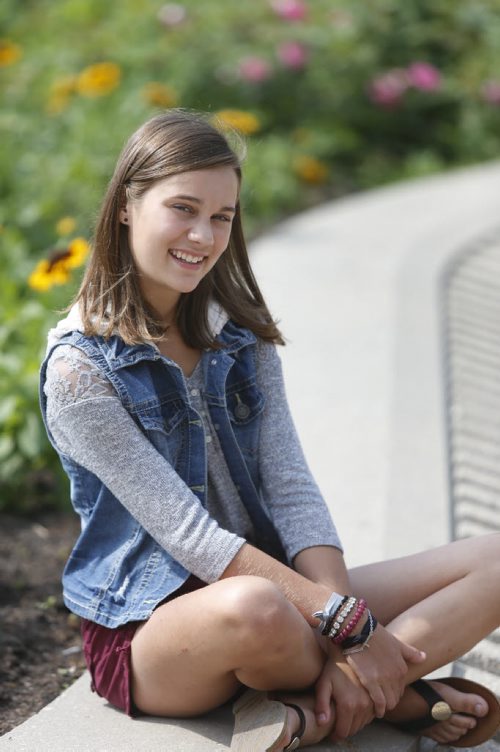 49.8 - IN CONVERSATION.  Maddie Thompson is only 13, but her clothing designs will hit racks across the country at the end of July.Wayne Glowacki / Winnipeg Free Press July 9  2015