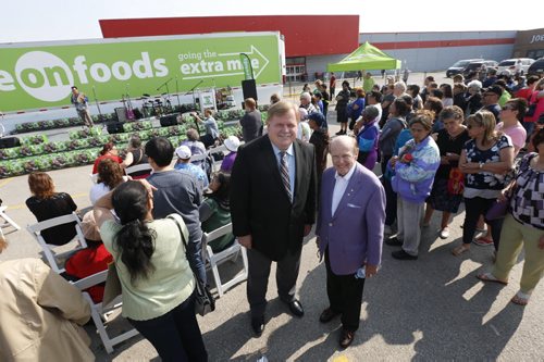 On the parking lot of the Northgate Shopping Centre on McPhillips Street Thursday, at left, Darrell Jones, pres. Save-On-Foods and Jim Pattison, chairman and CEO of The Jim Pattison Group at the supermarket chain's unveiling of its expansion plans for the Manitoba market including taking over the former Zellers store at this location. Murray McNeill story. Wayne Glowacki / Winnipeg Free Press July 9 2015 ¤