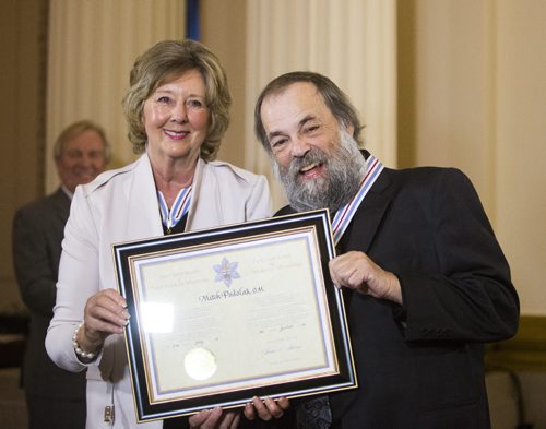 Mitch Podolak gets awarded the Order of Manitoba at the Manitoba Legislative Building in Winnipeg on Thursday, July 9, 2015.   Mikaela MacKenzie / Winnipeg Free Press