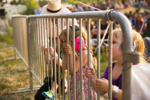 Kids listen to Trampled by Turtles at the Winnipeg Folk Festival in Birds Hill Park on Thursday, July 9, 2015.   Mikaela MacKenzie / Winnipeg Free Press