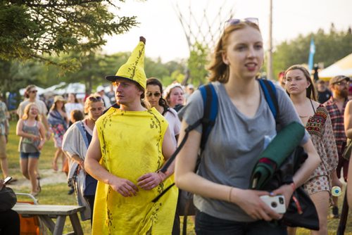 Dylan McMorris wears a banana costume to the Winnipeg Folk Festival in Birds Hill Park on Thursday, July 9, 2015.   Mikaela MacKenzie / Winnipeg Free Press