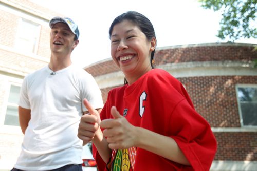 Keera Lyall beams and gives the two-thumbs-up as she talks to Jonathan Toews, Chicago Blackhawks captain and Stanley Cup champion, on his visit to the Rehabilitation Centre for Children Friday with the 2015 Stanley Cup.   July 10, 2015 n Ruth Bonneville / Winnipeg Free Press