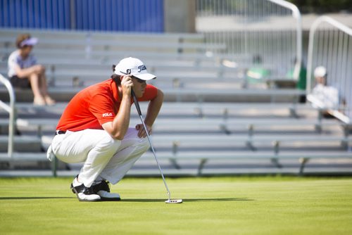 Drew Weaver watches the ball at the Pine Ridge Golf Club during the Players Cup on Friday, July 10, 2015.   Mikaela MacKenzie / Winnipeg Free Press