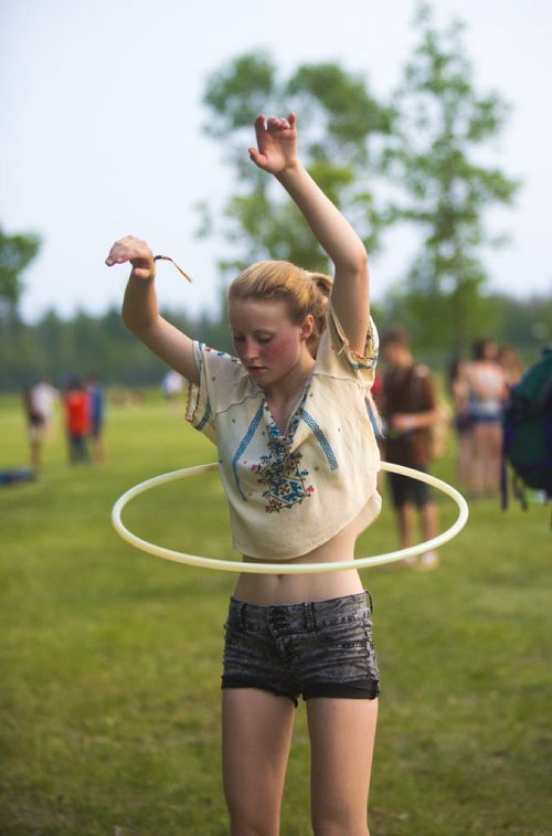 Lily Wheeler hula hoops at the Winnipeg Folk Festival in Birds Hill Park on Friday, July 10, 2015.   Mikaela MacKenzie / Winnipeg Free Press