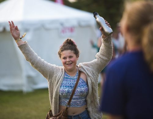 Greta Lahm catches bubbles at the Winnipeg Folk Festival in Birds Hill Park on Friday, July 10, 2015.   Mikaela MacKenzie / Winnipeg Free Press