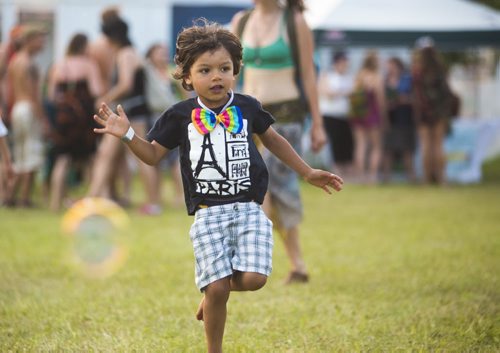 Efram Loewen Becker, 4, catches bubbles at the Winnipeg Folk Festival in Birds Hill Park on Friday, July 10, 2015.   Mikaela MacKenzie / Winnipeg Free Press