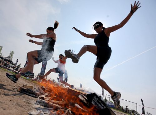 Competitors at the Spartan Race, a 5km obstacle course in Grunthal, Saturday, July 11, 2015. (TREVOR HAGAN/WINNIPEG FREE PRESS)