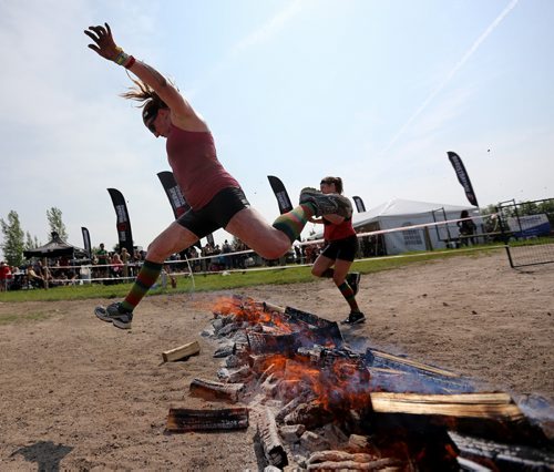 Competitors at the Spartan Race, a 5km obstacle course in Grunthal, Saturday, July 11, 2015. (TREVOR HAGAN/WINNIPEG FREE PRESS)