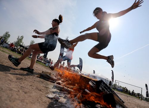 Competitors at the Spartan Race, a 5km obstacle course in Grunthal, Saturday, July 11, 2015. (TREVOR HAGAN/WINNIPEG FREE PRESS)