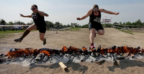 Competitors at the Spartan Race, a 5km obstacle course in Grunthal, Saturday, July 11, 2015. (TREVOR HAGAN/WINNIPEG FREE PRESS)