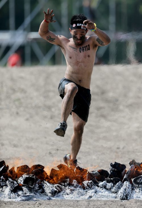 Competitors at the Spartan Race, a 5km obstacle course in Grunthal, Saturday, July 11, 2015. (TREVOR HAGAN/WINNIPEG FREE PRESS)