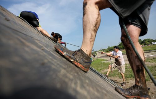 Competitors at the Spartan Race, a 5km obstacle course in Grunthal, Saturday, July 11, 2015. (TREVOR HAGAN/WINNIPEG FREE PRESS)