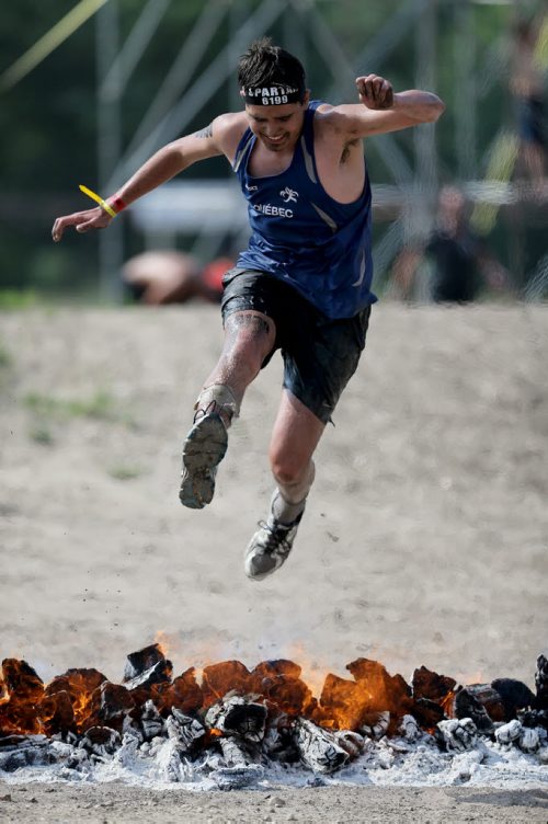 Competitors at the Spartan Race, a 5km obstacle course in Grunthal, Saturday, July 11, 2015. (TREVOR HAGAN/WINNIPEG FREE PRESS)