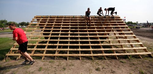 Competitors at the Spartan Race, a 5km obstacle course in Grunthal, Saturday, July 11, 2015. (TREVOR HAGAN/WINNIPEG FREE PRESS)