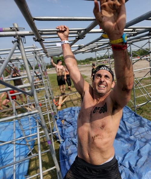 Competitors at the Spartan Race, a 5km obstacle course in Grunthal, Saturday, July 11, 2015. (TREVOR HAGAN/WINNIPEG FREE PRESS)