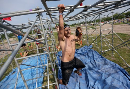 Competitors at the Spartan Race, a 5km obstacle course in Grunthal, Saturday, July 11, 2015. (TREVOR HAGAN/WINNIPEG FREE PRESS)